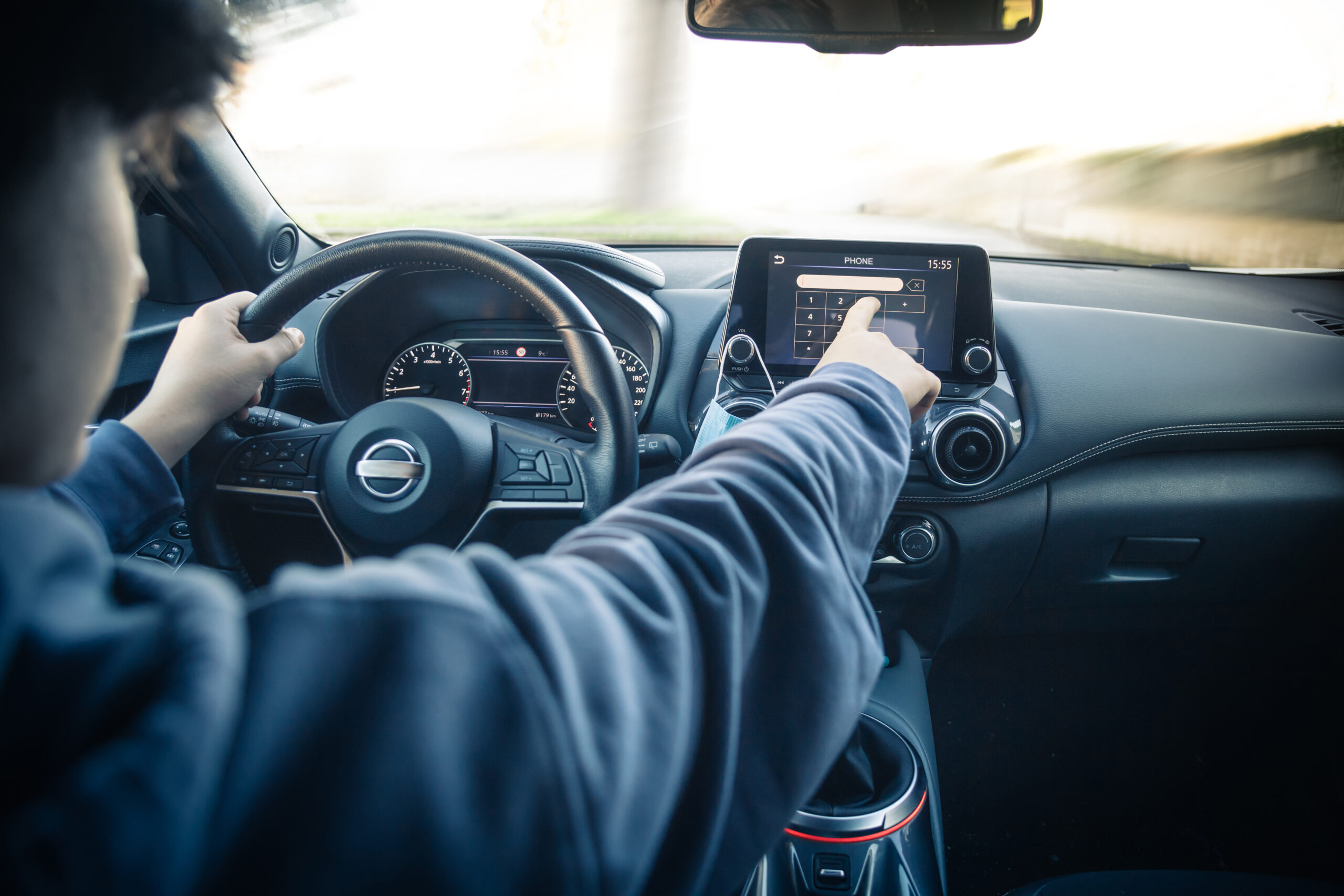 Teen,Drive,A,Car,And,Use,Infotainment.,Young,Man,Reading